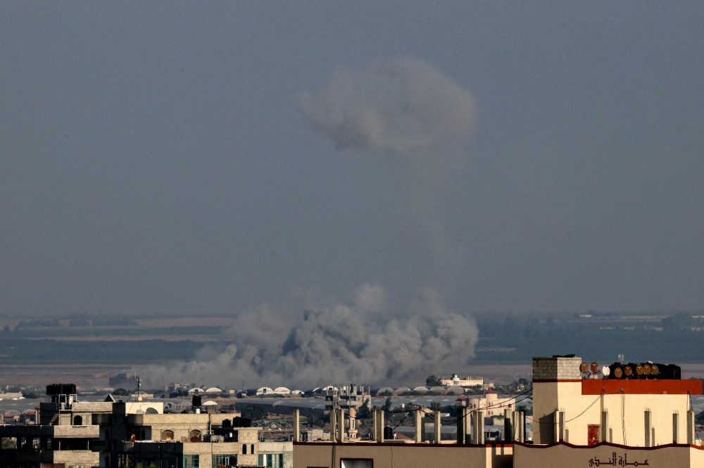 Smoke rises after the Israeli bombardment of Rafah in the southern Gaza Strip on November 3, 2023, amid the ongoing battles between Israel and the Palestinian group Hamas. — AFP pic