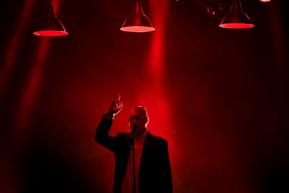 Former French football player and actor Eric Cantona performs at the Comedie Odeon Theatre in Lyon central-eastern France, on November 3, 2023. — AFP pic