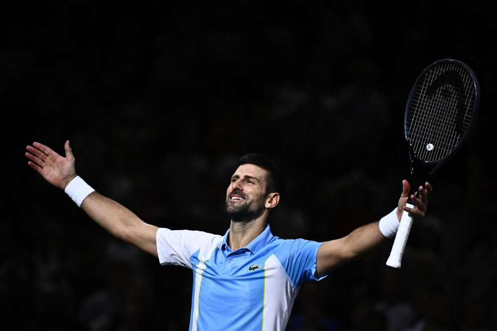 Serbia's Novak Djokovic celebrates after winning his men's singles semi-final match against Andrey Rublev on day six of the Paris ATP Masters 1000 tennis tournament at the Accor Arena - Palais Omnisports de Paris-Bercy - in Paris on November 4, 2023. — AFP pic