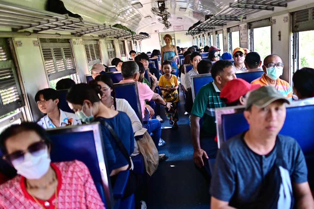 Tourists aboard the popular 