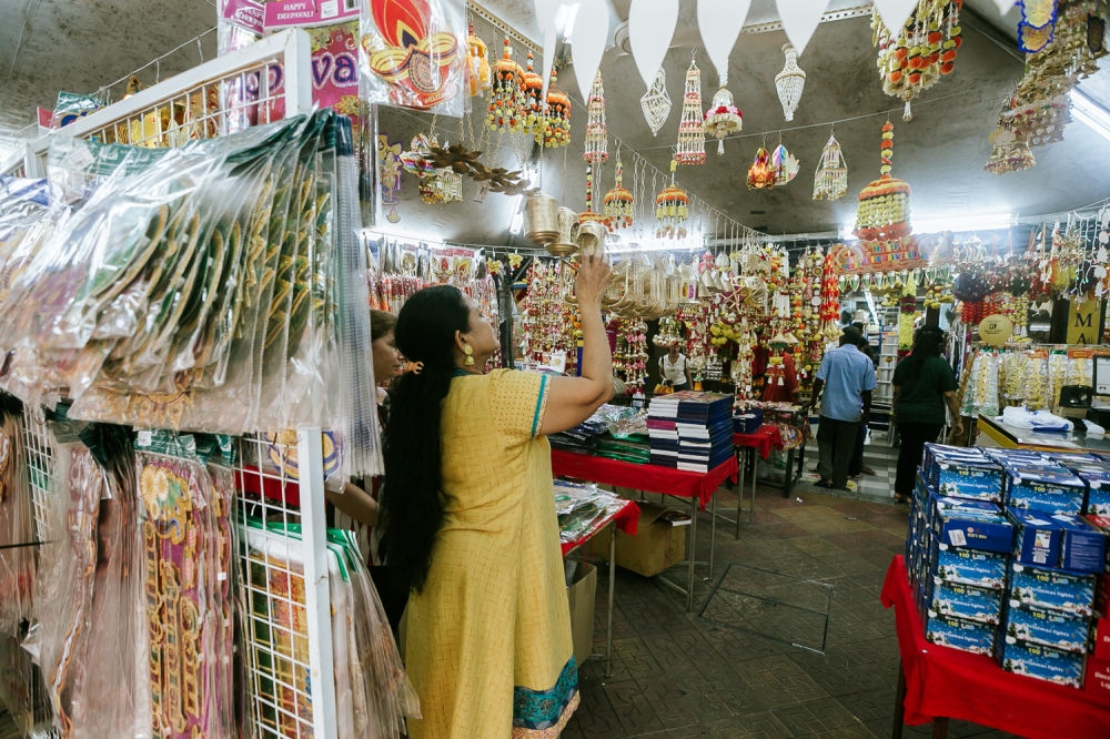 Early bird shoppers looking for the best deals at bazaars in Little India, Brickfields, before the crowd builds up.  