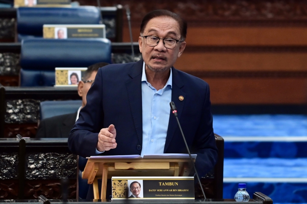 Prime Minister Datuk Seri Anwar Ibrahim speaks at the Parliament in Kuala Lumpur November 7, 2023. — Bernama pic