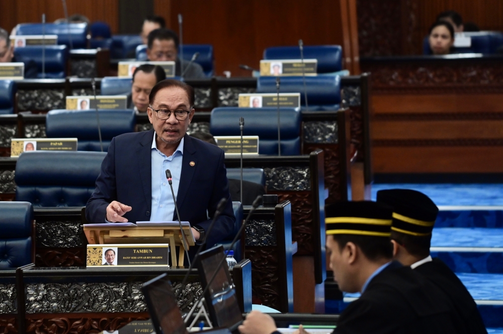 Prime Minister Datuk Seri Anwar Ibrahim speaks at the Parliament in Kuala Lumpur November 7, 2023. — Bernama pic