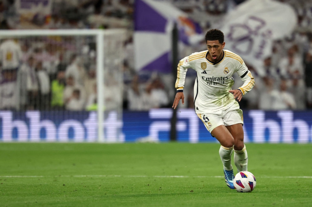 England international Jude Bellingham, who has scored 13 goals in 14 matches across all competitions, suffered a shoulder problem in the 0-0 La Liga draw with Rayo Vallecano on Sunday, although he played the whole match. — AFP pic 