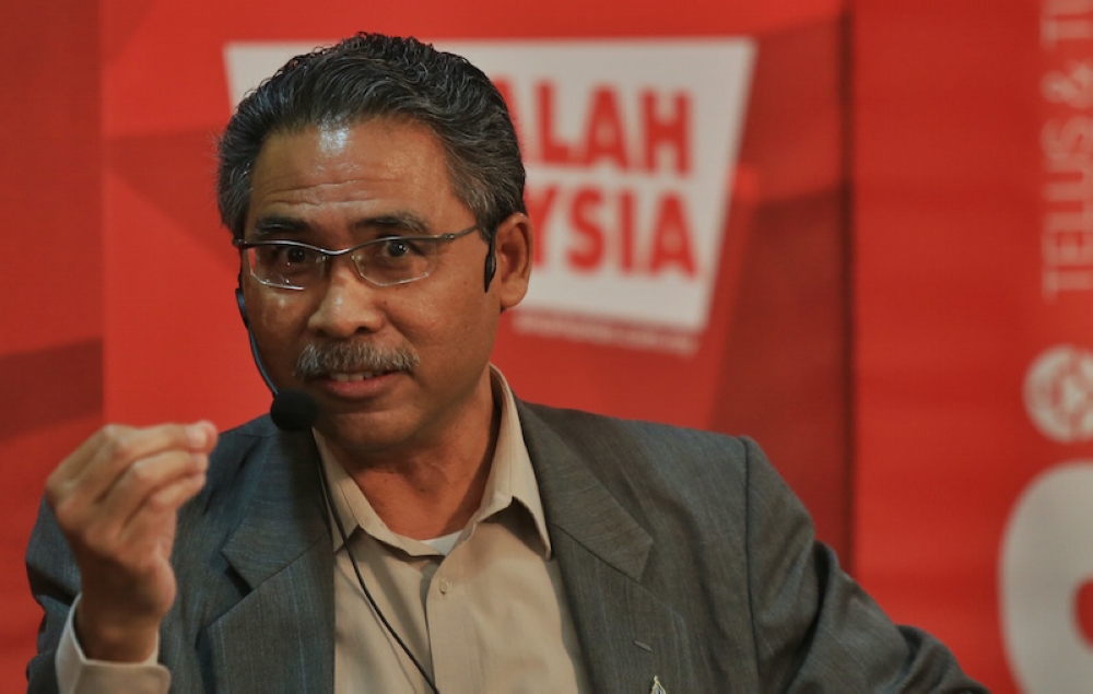 Nusantara Academy for Strategic Research senior fellow Azmi Hassan said what transpired was not really the result of a loophole because when they established the anti-party hopping law, the lawmakers knew that this can and could happen. — Picture by Saw Siow Feng