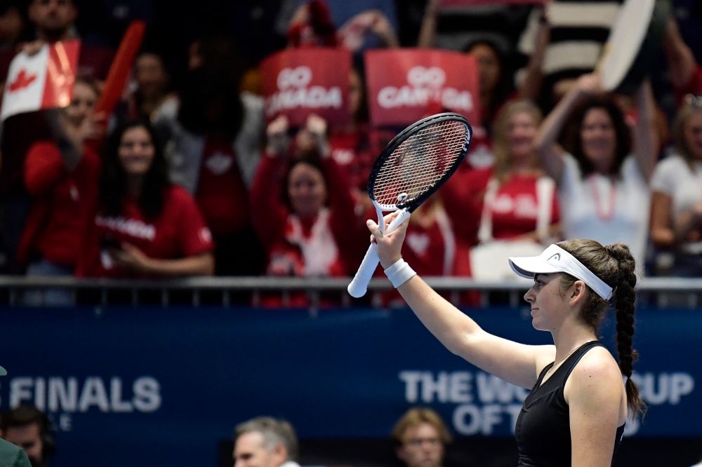 Canada’s Marina Stakusic celebrates beating Spain’s Rebeka Masarova after during the group stage group C singles tennis match between Spain and Canada on the day 2 of the Billie Jean King Cup Finals 2023 in La Cartuja stadium in Seville on November 8, 2023. — AFP pic 