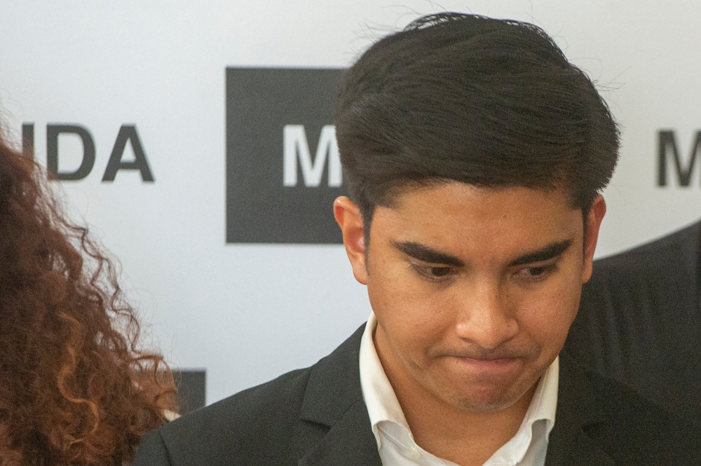 Malaysian United Democratic Alliance (Muda) president Syed Saddiq Abdul Rahman reacts during the Muda special press conference announcing his decision to step down as party president in Petaling Jaya November 9, 2023. — Picture by Shafwan Zaidon