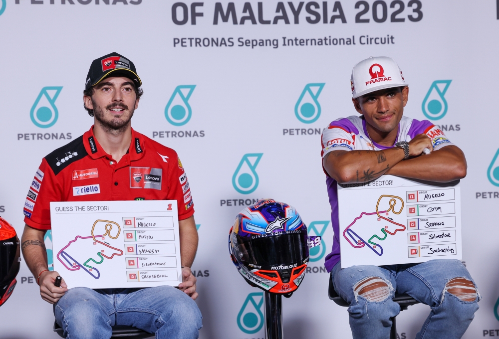 (From left) Ducati Lenovo Team rider Francesco Bagnaia and Prima Pramac Racing rider Jorge Martin speak to the media during the 2023 Malaysian Motorcycle Grand Prix pre-event press conference at the Sepang International Circuit November 9, 2023. — Bernama pic