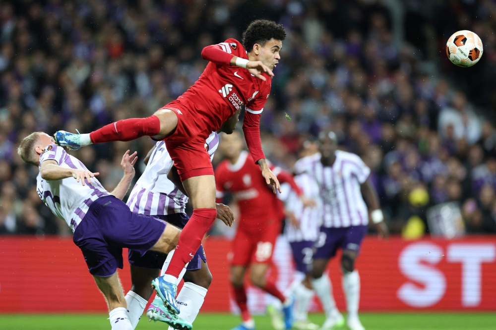 Liverpool's Colombian midfielder #07 Luis Diaz heads the ball ahead of Toulouse's Danish defender #03 Mikkel Desler Puggaard during the Uefa Europa League Group E football match between Toulouse FC (TFC) and Liverpool at the Stadium de Toulouse, in Toulouse, southwestern France on November 9, 2023. — AFP pic