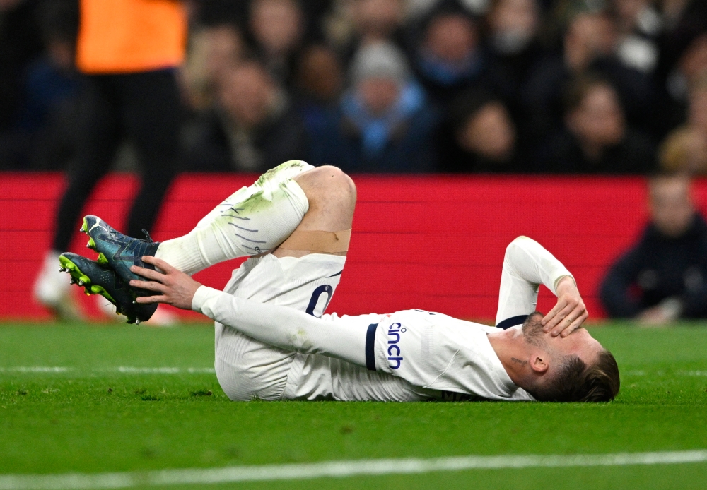 Tottenham Hotspur’s James Maddison reacts after sustaining an injury during a match against Chelsea at Tottenham Hotspur Stadium, London, November 6, 2023. — Reuters pic 