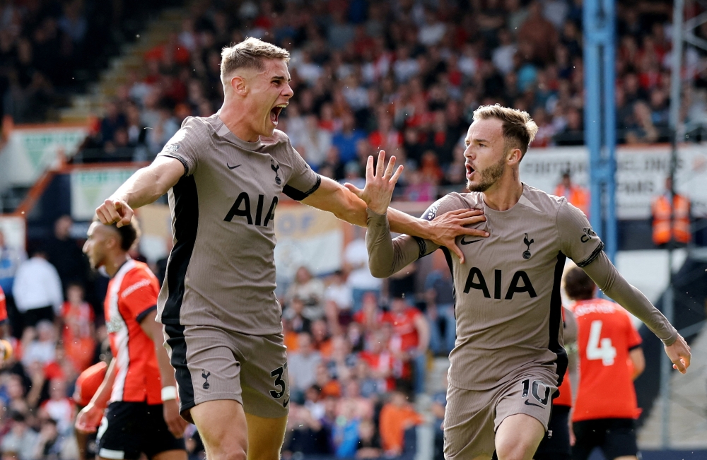 Tottenham Hotspur’s Micky van de Ven celebrates scoring their first goal with James Maddison against Luton Town at Kenilworth Road, Luton, October 7, 2023. — Reuters pic 