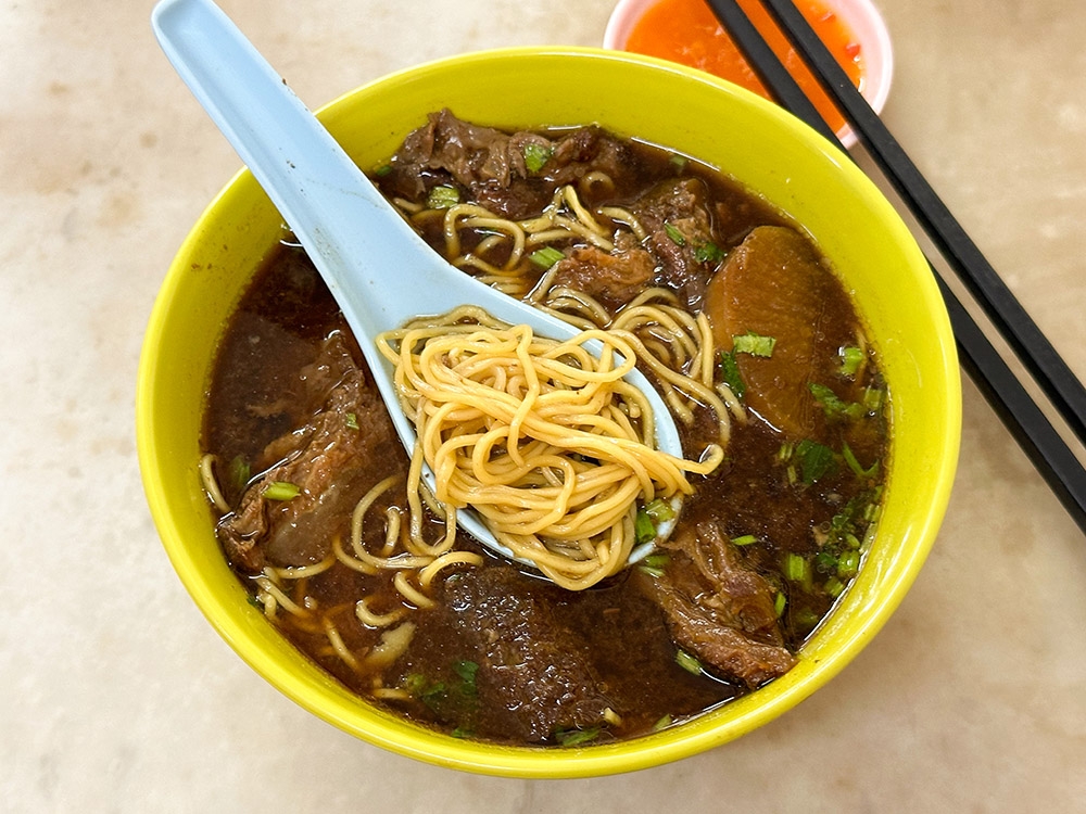 The egg noodles are springy and delicious with the mild beef broth.