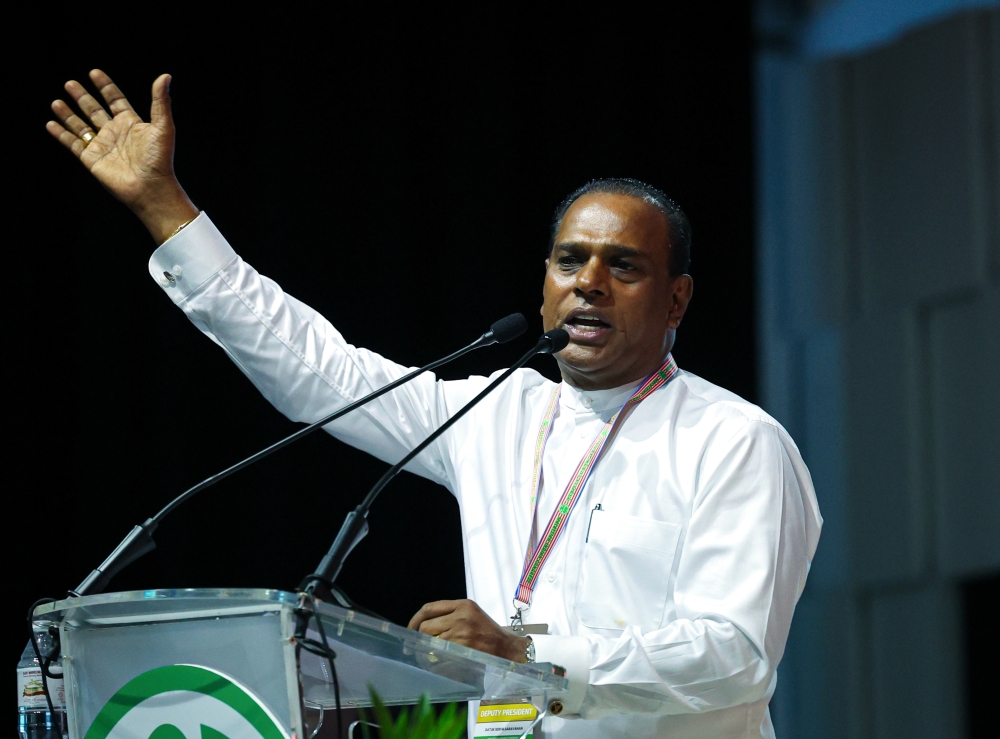 MIC deputy president Datuk Seri M. Saravanan delivers a speech during the 77th MIC general assembly at the Malaysia Agro Exposition Park Serdang November 18, 2023. — Bernama pic