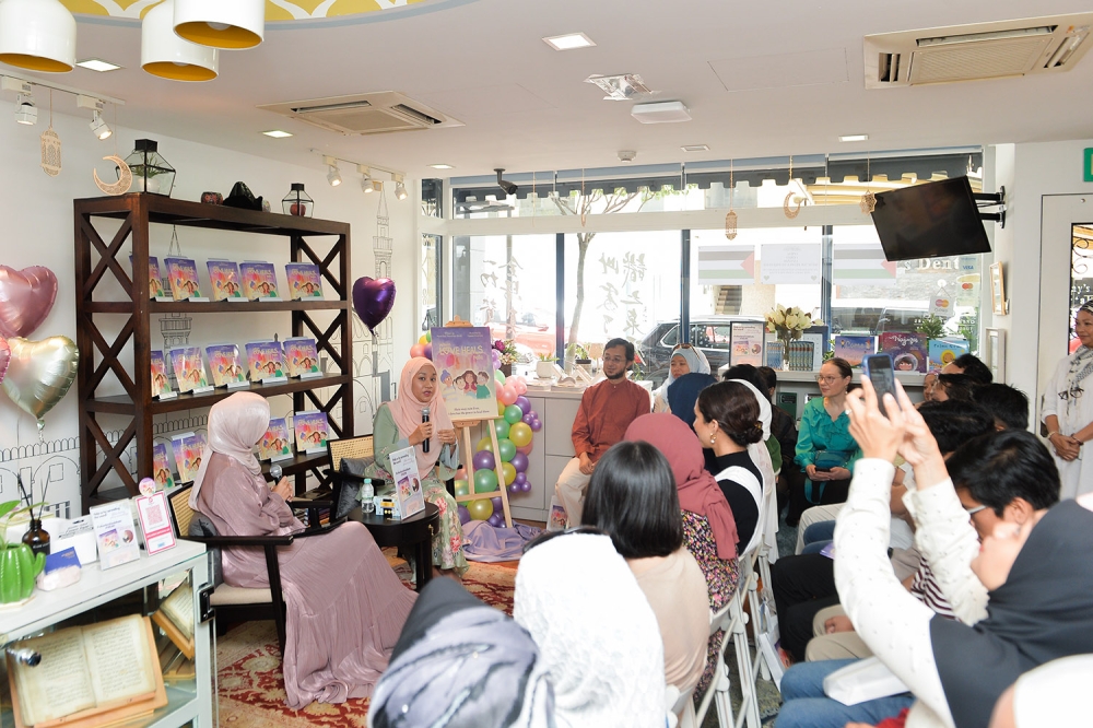 ‘When Love Heals Hate’ book author Murni Wan Mohd Nor speaks during the launch of the book in Kuala Lumpur November 11, 2023. — Picture by Miera Zulyana