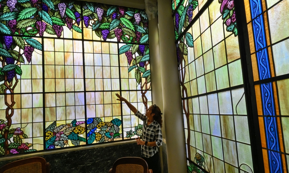 The teacher of stained glass restoration at the School Workshop of Havana, Mirell Vazquez. — AFP pic