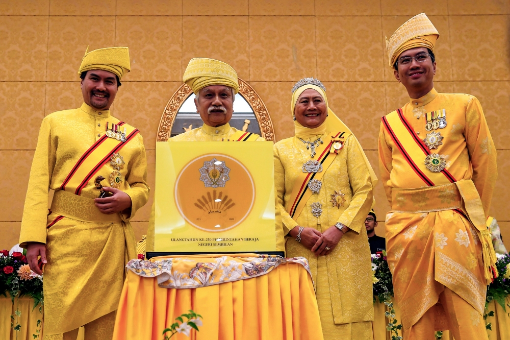 Yang Dipertuan Besar of Negeri Sembilan Tuanku Muhriz Tuanku Munawir (2nd left) and Tunku Ampuan Besar Negeri Sembilan Tuanku Aishah Rohani Tengku Besar Mahmud (2nd right) are seen at the launch of a special logo in conjunction with the 250th anniversary of the Negeri Sembilan royal institution at Istana Besar Seri Menanti November 19, 2023. Also present are Tunku Besar Seri Menanti Tunku Ali Redhauddin Tuanku Muhriz (left) and Tunku Putera Tunku Zain Al’Abidin Tuanku Muhriz. — Bernama pic