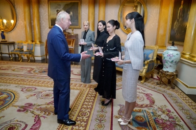 K-Pop band Blackpink receive honorary MBEs from Britain’s King Charles