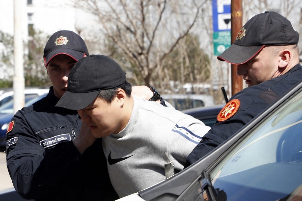 South Korean cryptocurrency entrepreneur co-founder of Terraform Labs (Terra Luna), Do Kwon (centre), is taken to court after being arrested at the airport in Podgorica, Montenegro March 24, 2023. — AFP pic