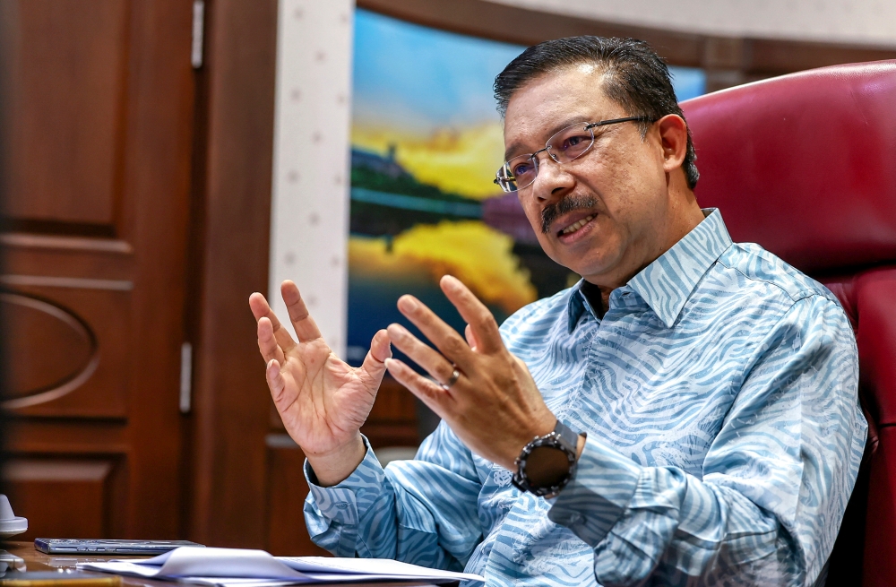 Chief Secretary to the Government, Tan Sri Mohd Zuki Ali speaks at an interview in his office. — Bernama pic