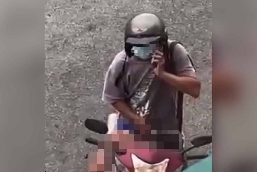 A screengrab from the 42-second video shows a man exposing his genitals in Simpang Renggam near Kluang on November 23, 2023. — Picture from social media.