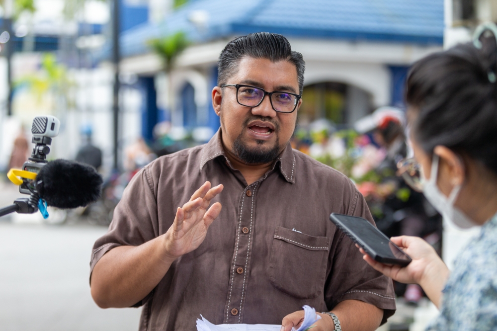 Badrul Hisham Shaharin also known as Chegubard speaks to Malay Mail at the federal police headquarters in Bukit Aman, December 1, 2023. — Picture by Raymond Manuel