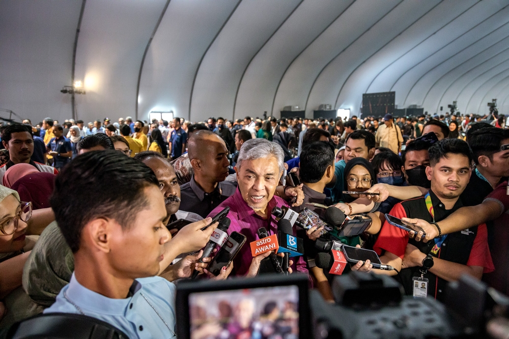 Umno president Datuk Seri Ahmad Zahid Hamidi said Umno supreme council member Isham Jalil will be given a letter soon regarding his party membership status. — Picture by Firdaus Latif