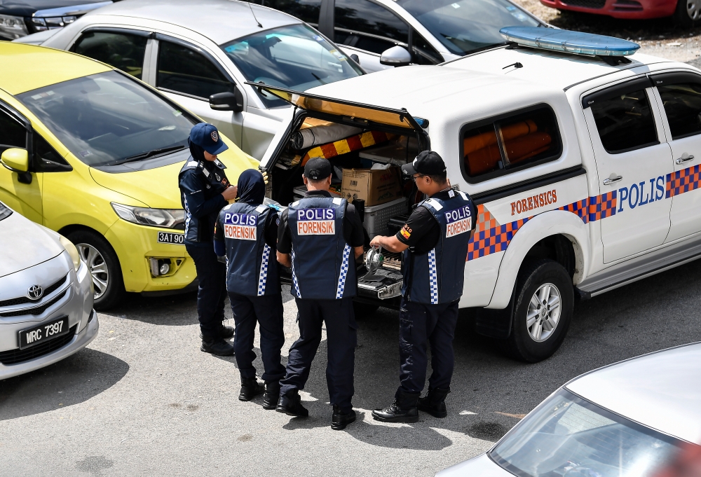 Members of the Royal Malaysian Police Forensic Unit arrive near the location where the body of Zayn Rayyan Abdul Mattin was found, which was 200 meters away from his residence in Apartment Idaman, Damansara Damai, to continue the investigation December 10, 2023. — Bernama pic