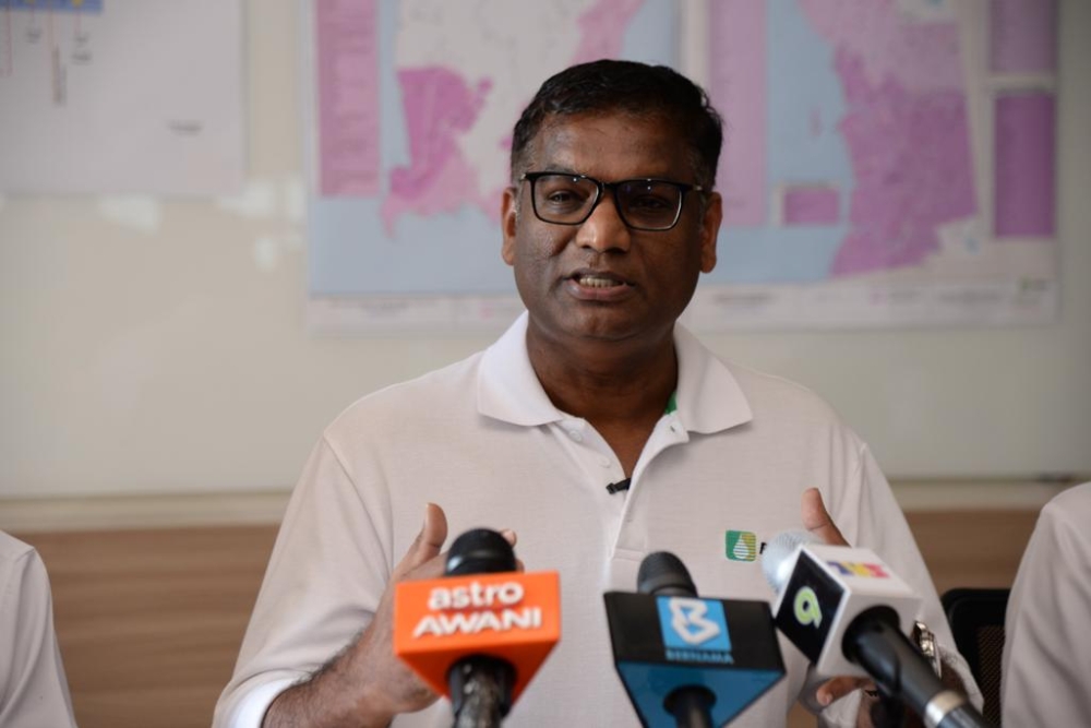 Penang Water Supply Corporation chief executive officer K. Pathmanathan speaks during a news conference in George Town December 13, 2023. — Picture by Opalyn Mok