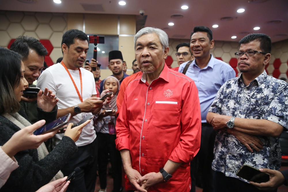 Umno president Datuk Seri Ahmad Zahid Hamidi speaks to reporters at the party's headquarters in Kuala Lumpur March 18, 2023. ― Picture by Yusof Mat Isa