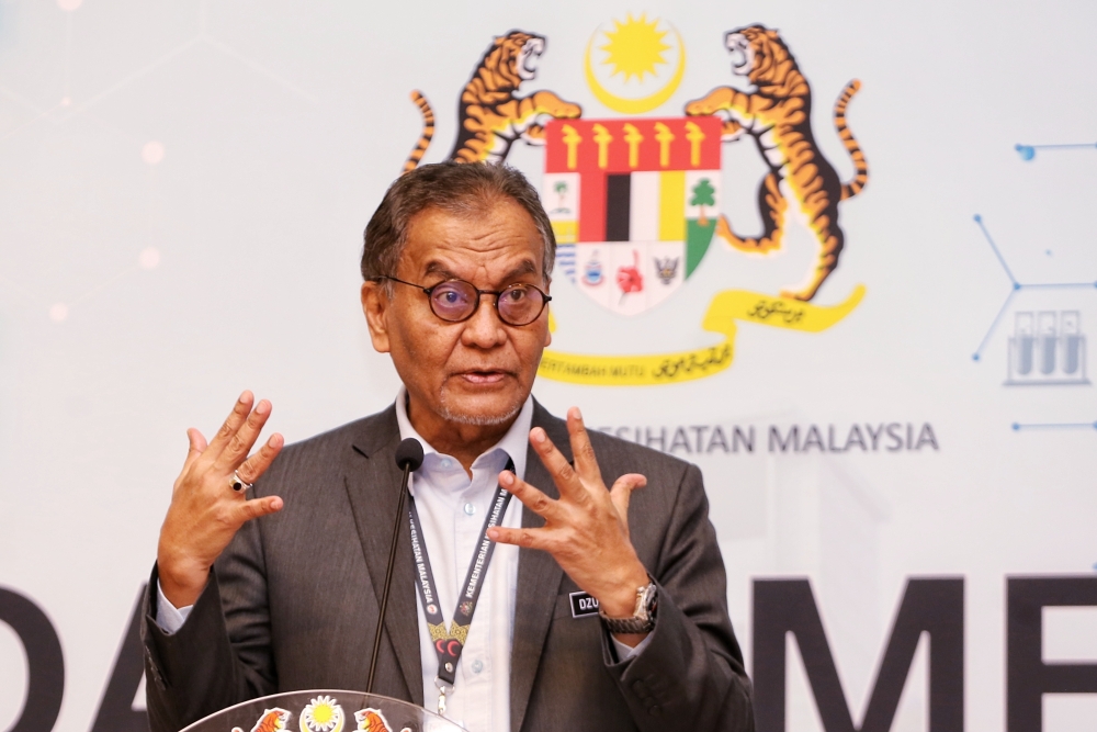 Health Minister Datuk Seri Dzulkefly Ahmad speaking at a press conference on Covid-19 in Malaysia at the Ministry of Health, Putrajaya, December 18,  2023. — Picture by Choo Choy May .