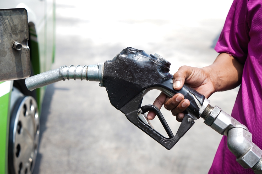 A heavy vehicle refuels diesel at a petrol station in Petaling Jaya, October 12, 2023. Domestic Trade and Cost of Living Minister Datuk Armizan Mohd Ali said the ministry conducted checks with the said fuel company yesterday and was informed that it did not require an additional quota of subsidised diesel at the moment to meet demand. — Picture by Ahmad Zamzahuri