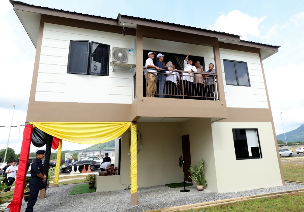 Sarawak Premier Tan Sri Abang Johari Openg during a visit to the Sungai Bedaun affordable housing scheme in Kuching January 6, 2023. — Bernama pic