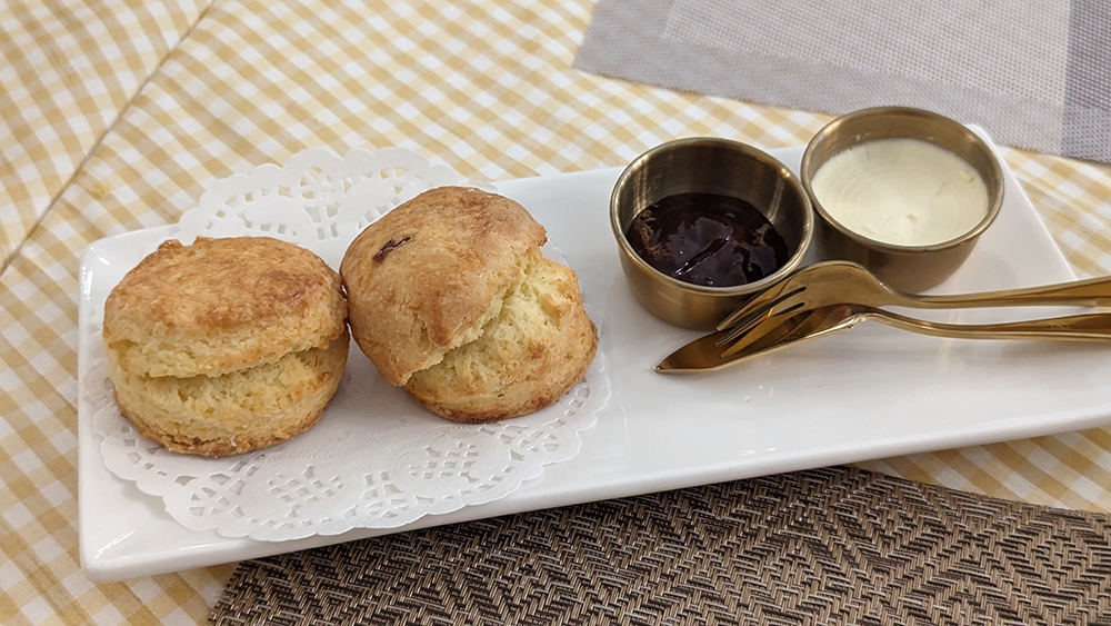 From the left: orange poppy, cranberry scones and the requisite accompaniments.