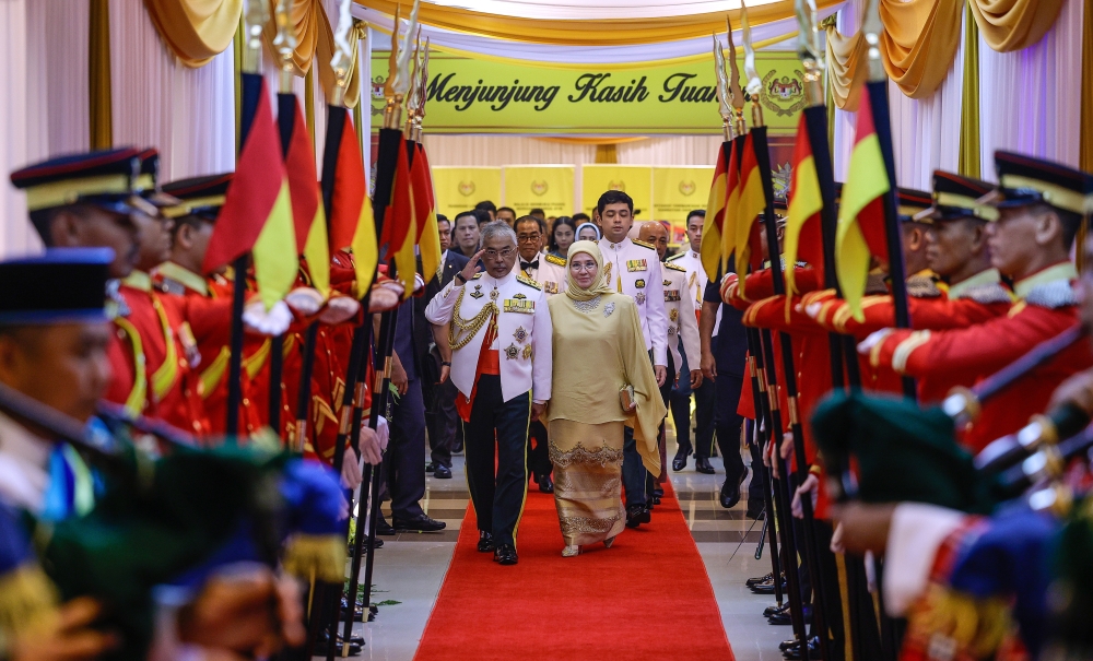 Upon their arrival, the King and Queen were greeted with the singing of the National Anthem before the procession of the Ensigns of His Majesty the Yang di-Pertuan Agong entered the hall. — Bernama pic 