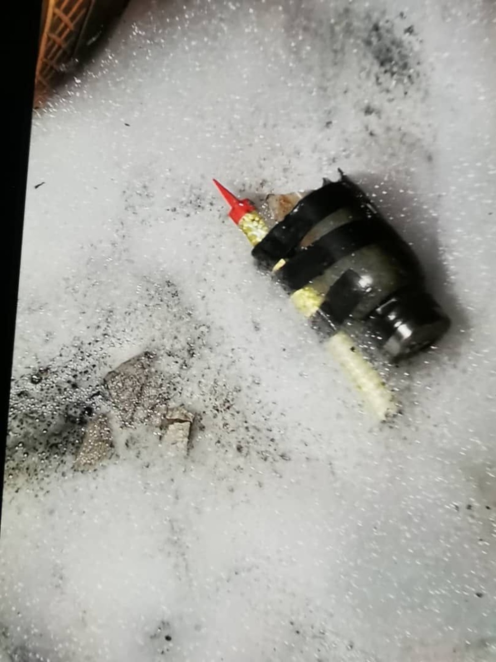 Cops found a Molotov cocktail in the fire incident at Beruas MP Ngeh Koo Ham’s house in Ayer Tawar near Manjung. ― Picture courtesy of Perak police