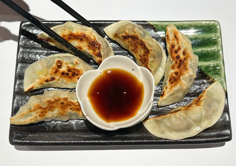 Yaki-Gyoza are delightful bites of juicy vegetables, tofu and mushrooms.