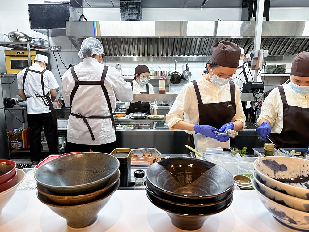 You get to see the goings-on in their open kitchen.