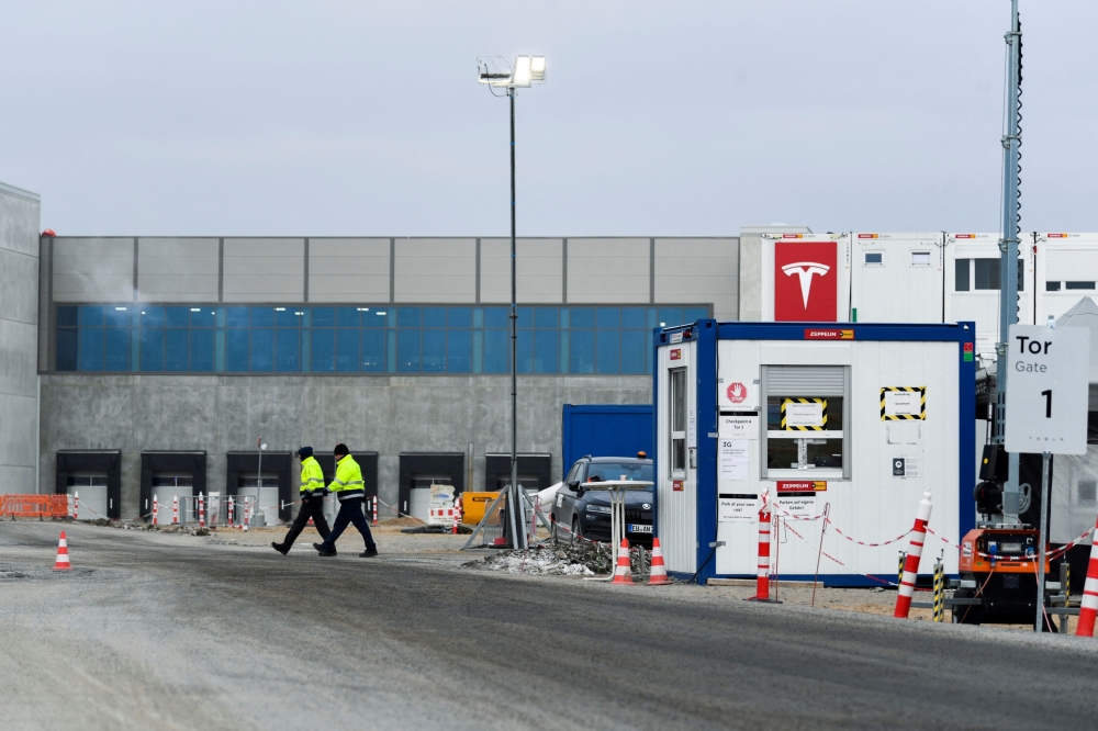 A general view shows an entrance gate on the construction site of Tesla's electric car factory in Gruenheide, near Berlin in Germany December 28, 2021. ― Reuters file pic