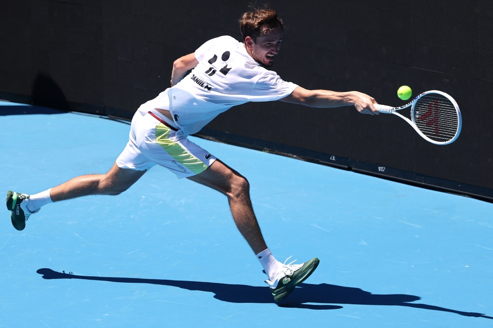 Russia’s Daniil Medvedev hits a return at a practice session in Melbourne on January 12, 2024 ahead of the Australian Open tennis championship starting on January 14. — AFP pic