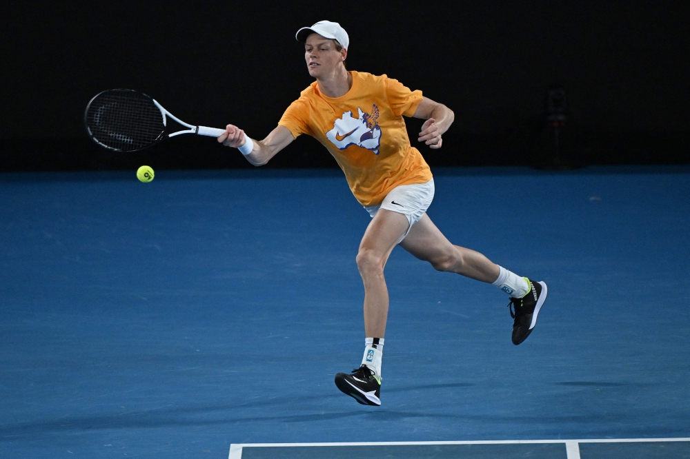 Italy’s Jannik Sinner hits a return during a practice session in Melbourne on January 13, 2024 ahead of the Australian Open tennis championship starting on January 14. — AFP pic