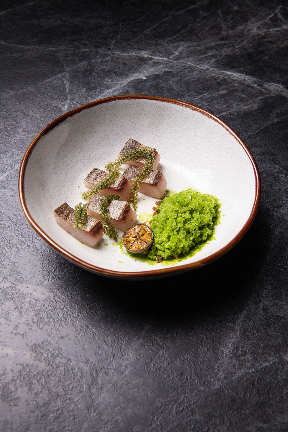 Smoke + Raw, an inventive dish that incorporates smoked fish and 'lei cha' – Photo courtesy of Barkar KL.