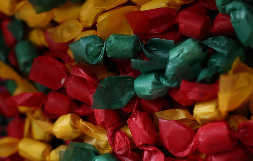 Wrapped pieces of ‘Coklat Nise’, a sweet candy, can be seen during its production at Taman Desa Kemumin, Padang Tembak, Pengkalan Chepa January 14, 2024. — Bernama pic