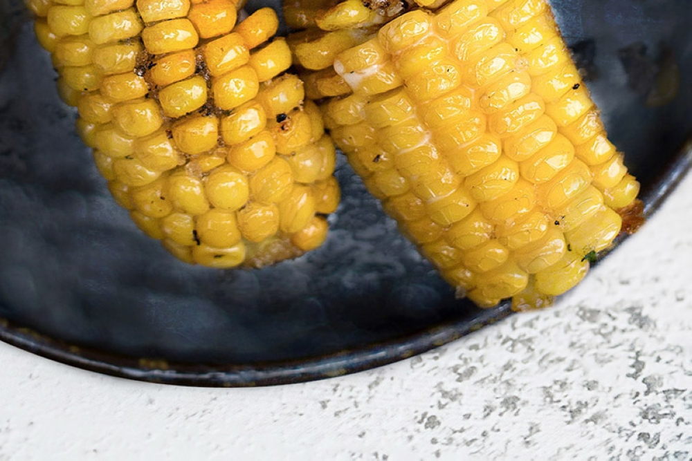 Use corn on the cob or even leftover kernels from boiled and grilled corn.