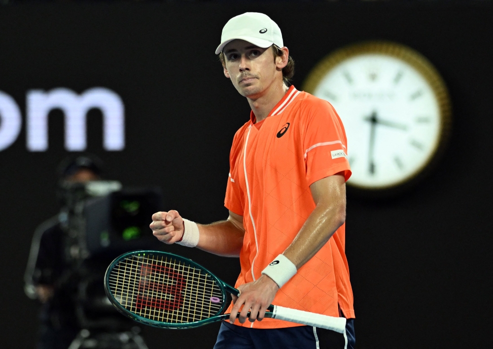 Australia's Alex De Minaur celebrates after winning his second round match against Italy's Matteo Arnaldi in Melbourne January 17, 2024. ― Reuters pic