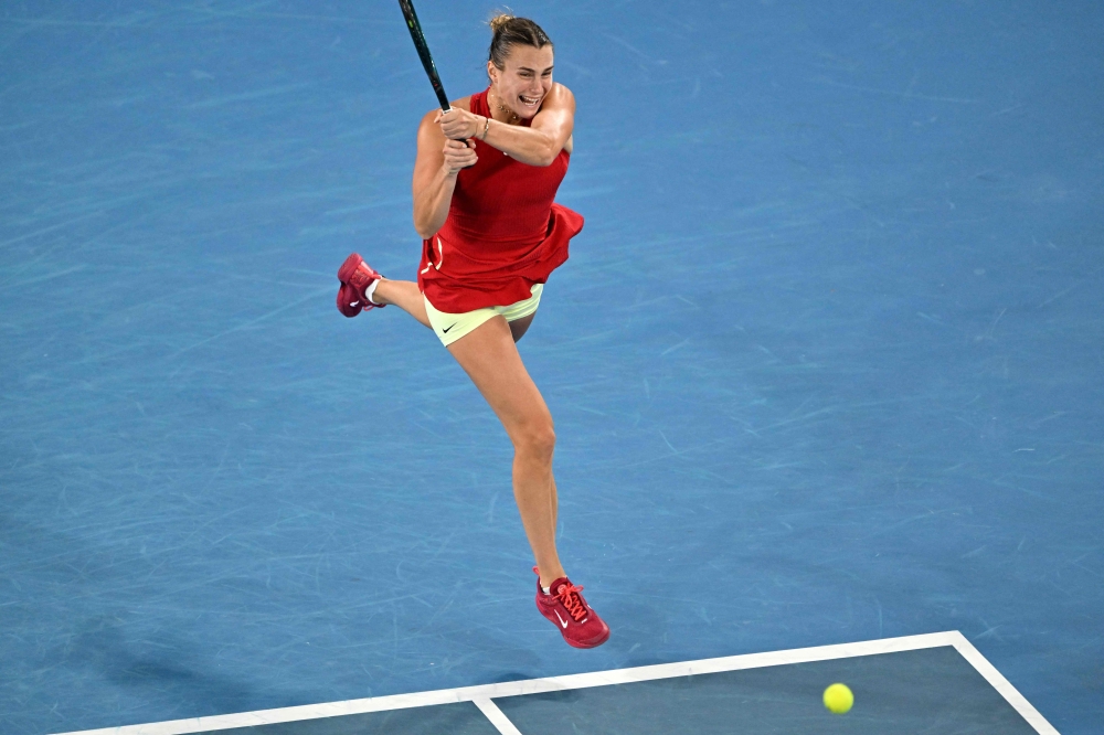 Belarus’ Aryna Sabalenka hits a return against USA’s Amanda Anisimova during their women’s singles match on day eight of the Australian Open tennis tournament in Melbourne on January 21, 2024. — AFP pic 