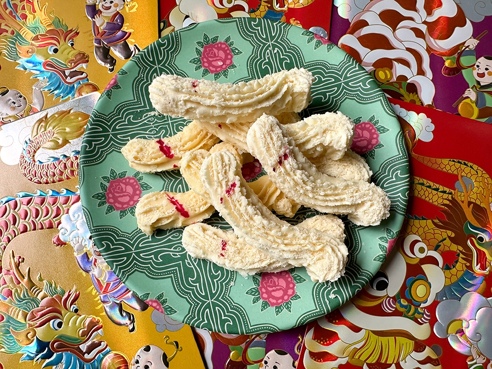 The dragon cookies from the fruit stall opposite Hakka Legend Restaurant in Taman Megah may look less than mythical but its crumbly texture wins