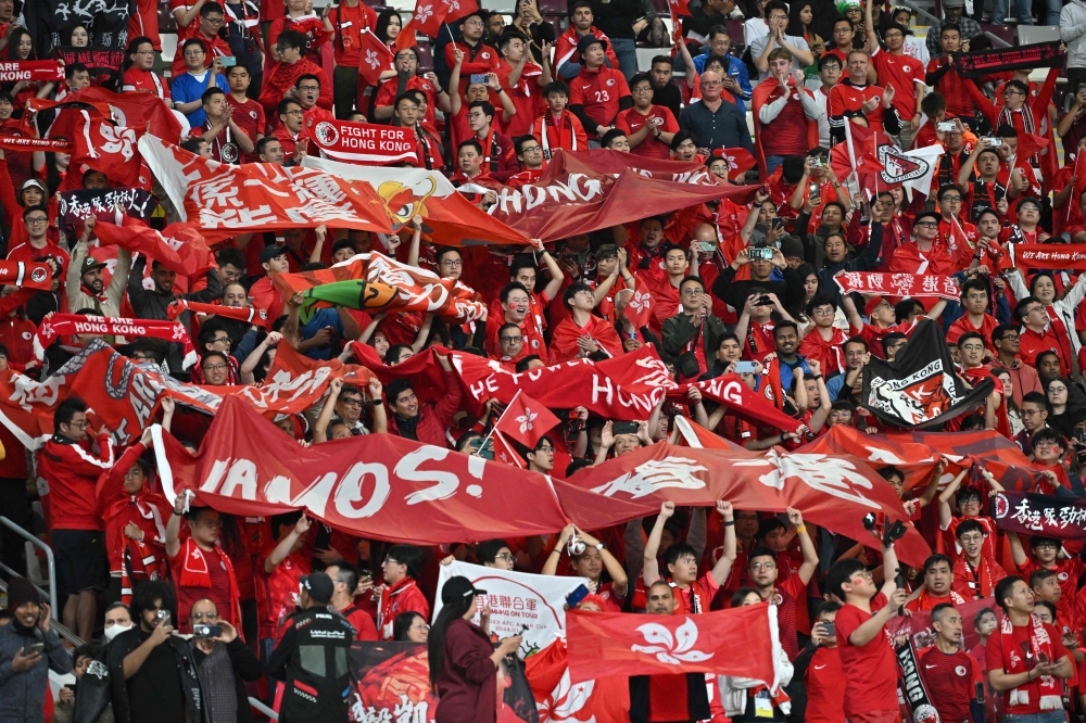 Hong Kong supporters cheer for their team before the start of the Qatar 2023 AFC Asian Cup Group C football match between Hong Kong and Iran at the Khalifa International Stadium in Doha January 19, 2024. — AFP pic 