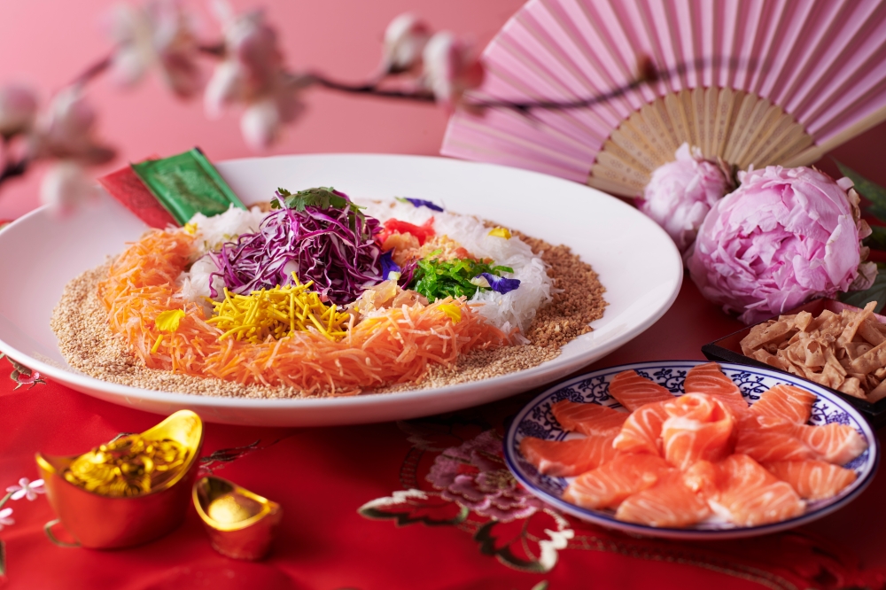 Partake in the tradition of tossing to prosperity with refined yee sang selections. — Picture courtesy of PARKROYAL COLLECTION Kuala Lumpur