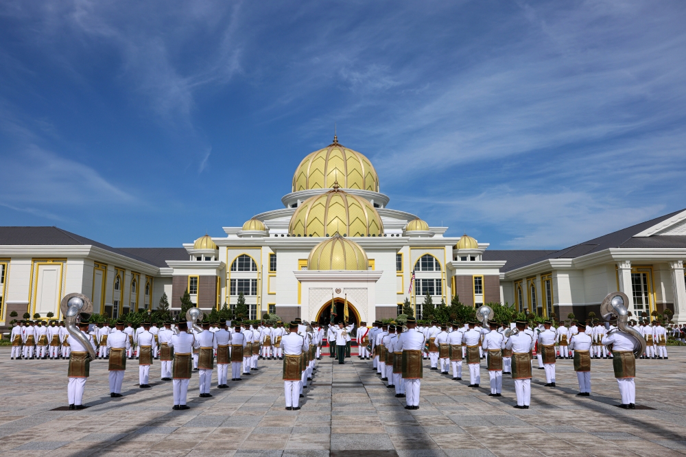 His Majesty Sultan Ibrahim of Johor acknowledged the Royal Salute from the main guard-of-honour mounted by four officers and 103 men from the 1st Battalion Royal Malay Regiment led by Major Nurul Fauzan Md Sabri at the Istana Negara Square. — Bernama pic