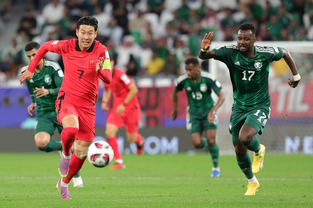 South Korea’s midfielder #07 Son Heung-min runs with the ball past Saudi Arabia’s defender #17 Hassan al-Tambakti during the Qatar 2023 AFC Asian Cup football match between Saudi Arabia and South Korea at Education City Stadium in al-Rayyan, west of Doha, on January 30, 2024. — AFP pic